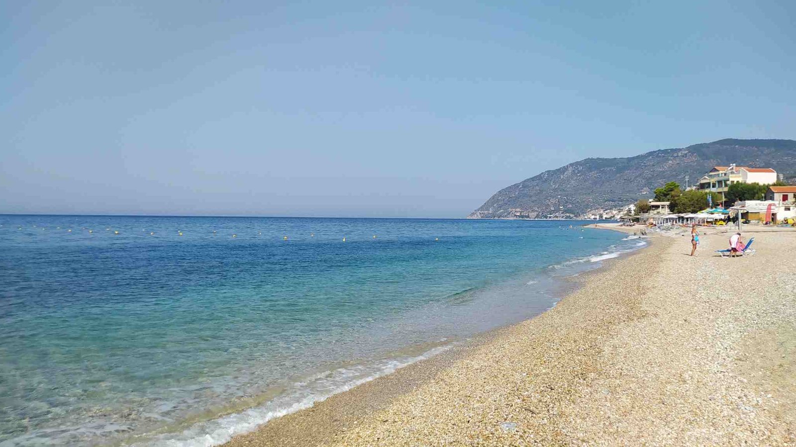 The long shoreline of Agios Isidoros